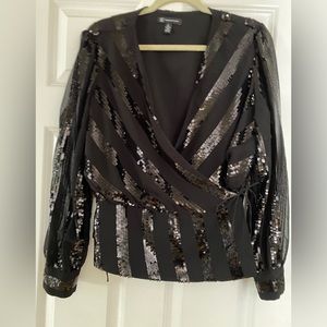 Sequence black long sleeve wrapped blouse